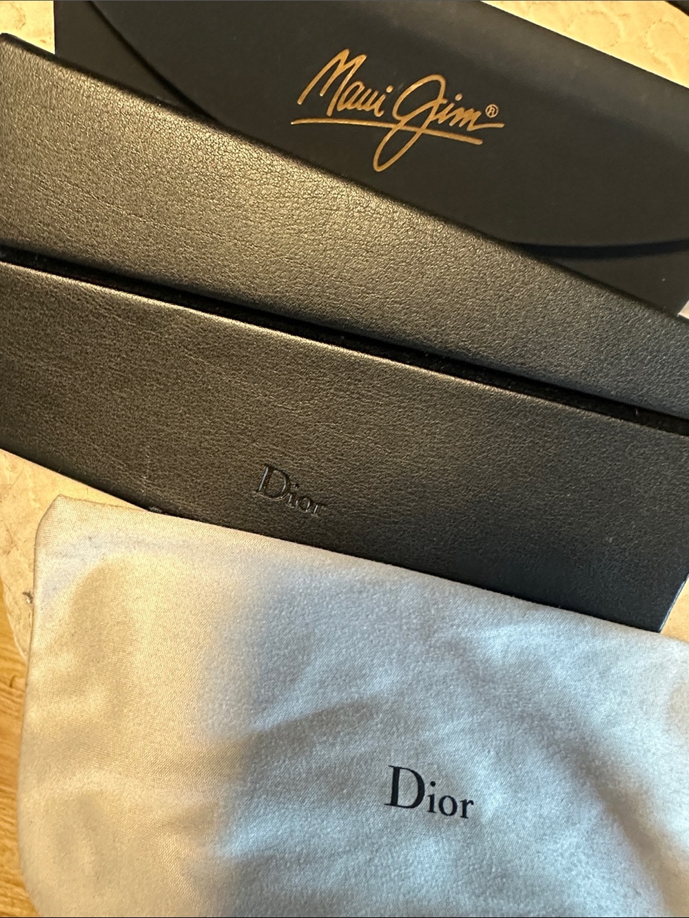 Bundle of Dior and Maui  sunglasses cases.
Dior included  Gray Dior Pouch/used
